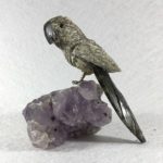 LORO TALLADO EN PIEDRA